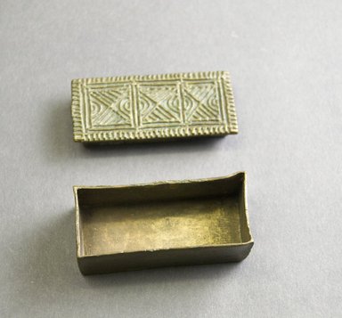Akan. <em>Gold Dust Box with Lid</em>, 19th-20th century. Copper Alloy, 2 1/4 x 1 x 3/4 in. Brooklyn Museum, Gift of Mr. and Mrs. Franklin H. Williams, 88.192.30a-b. Creative Commons-BY (Photo: Brooklyn Museum, 88.192.30a-b_view2_PS5.jpg)