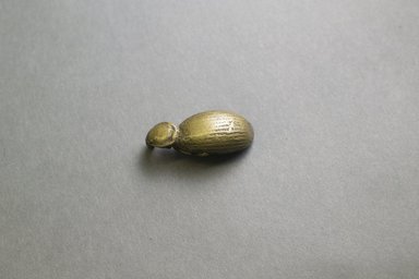 Akan. <em>Gold-weight (abrammuo): insect</em>, 19th-20th century. Copper alloy, 1 3/4 x 3/4 in. Brooklyn Museum, Gift of Mr. and Mrs. Franklin H. Williams, 88.192.36. Creative Commons-BY (Photo: Brooklyn Museum, 88.192.36_top_PS5.jpg)