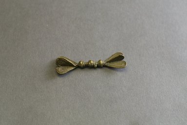 Akan. <em>Gold Weight</em>, 19th-20th century. Copper alloy, 2 x 5/8 in. (5.1 x 1.6 cm). Brooklyn Museum, Gift of Mr. and Mrs. Franklin H. Williams, 88.192.55. Creative Commons-BY (Photo: Brooklyn Museum, 88.192.55_front_PS5.jpg)