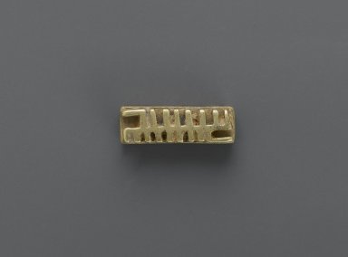 Akan. <em>Gold-weight (abrammuo): geometric</em>, 19th–20th century. Cast brass, 1/4 x 3/8 x 1 in. (0.6 x 1 x 2.5 cm). Brooklyn Museum, Gift of Mr. and Mrs. Franklin H. Williams, 88.192.88. Creative Commons-BY (Photo: Brooklyn Museum, 88.192.88_PS6.jpg)