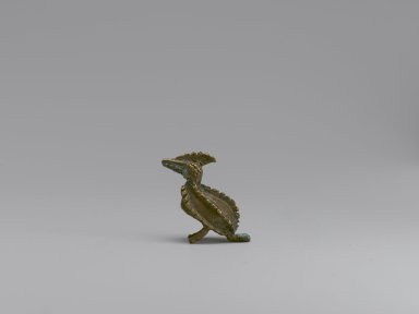 Akan. <em>Gold-weight (abrammuo): bird</em>, 19th-20th century. Cast brass, 1 1/8 x 1/2 x 1 1/2 in. (2.9 x 1.3 x 3.8 cm). Brooklyn Museum, Gift of Mr. and Mrs. Franklin H. Williams, 88.192.99. Creative Commons-BY (Photo: Brooklyn Museum, 88.192.99_side1_PS6.jpg)