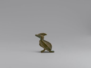 Akan. <em>Gold-weight (abrammuo): bird</em>, 19th–20th century. Cast brass, 1 1/8 x 1/2 x 1 1/2 in. (2.9 x 1.3 x 3.8 cm). Brooklyn Museum, Gift of Mr. and Mrs. Franklin H. Williams, 88.192.99. Creative Commons-BY (Photo: Brooklyn Museum, 88.192.99_side1_PS6.jpg)