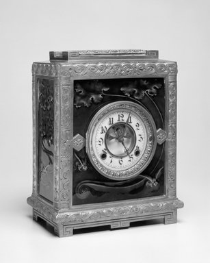 New Haven Clock Company (working ca. 1853–1956). <em>Clock, Albatross</em>, Patented January 5, 1886. Brass and glazed earthenware tiles, 12 1/4 x 9 x 5 1/4 in. (31.1 x 22.9 x 13.3 cm). Brooklyn Museum, H. Randolph Lever Fund, 88.23. Creative Commons-BY (Photo: Brooklyn Museum, 88.23_bw.jpg)