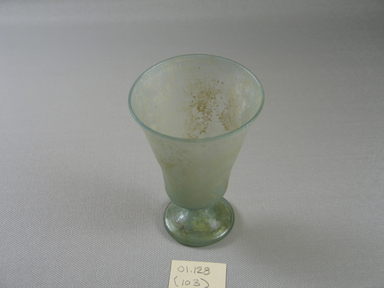 Roman. <em>Small Goblet of Plain Blown Glass</em>, 1st-5th century C.E. Glass, 4 x greatest diam. 2 13/16 in. (10.2 x 7.1 cm). Brooklyn Museum, Gift of Robert B. Woodward, 01.128. Creative Commons-BY (Photo: Brooklyn Museum, CUR.01.128.jpg)