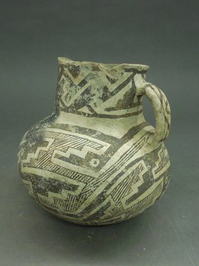 Possibly Mimbres. <em>Pitcher</em>. Clay, slip, 5 1/2 x 5 in (14 x 12.7 cm). Brooklyn Museum, Gift of Charles A. Schieren, 01.1538.1753. Creative Commons-BY (Photo: Brooklyn Museum, CUR.01.1538.1753.jpg)