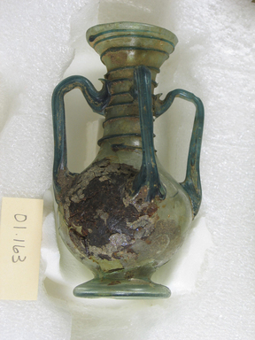 Roman. <em>Vase of Plain Blown Glass</em>, 4th-5th century C.E. Glass, 3 15/16 x Length 2 3/8 in. (10 x 6 cm). Brooklyn Museum, Gift of Robert B. Woodward, 01.163. Creative Commons-BY (Photo: Brooklyn Museum, CUR.01.163.jpg)
