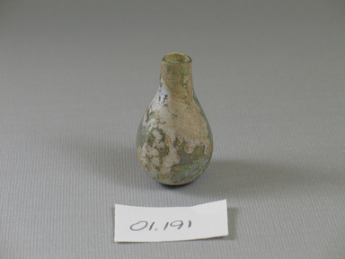 Roman. <em>Bottle of Plain Blown Glass</em>, 1st century C.E. Glass, 1 11/16 x greatest diam. 1 in. (4.3 x 2.5 cm). Brooklyn Museum, Gift of Robert B. Woodward, 01.191. Creative Commons-BY (Photo: Brooklyn Museum, CUR.01.191.jpg)