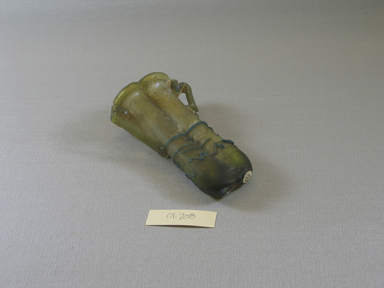 Roman. <em>Double Cosmetic Tube with Handles</em>, 4th-5th century C.E. Glass, 2 15/16 x 1 5/8 x 4 5/8 in. (7.4 x 4.1 x 11.8 cm). Brooklyn Museum, Gift of Robert B. Woodward, 01.208. Creative Commons-BY (Photo: Brooklyn Museum, CUR.01.208_view1.jpg)