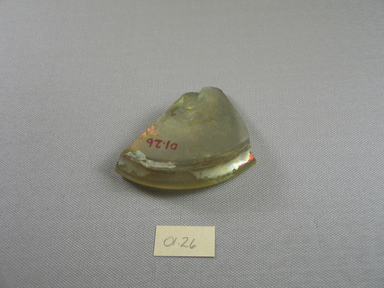 Roman. <em>Fragment of Pale Green Glass</em>, 1st-5th century C.E. Glass, 1/2 x 3 in. (1.2 x 7.6 cm). Brooklyn Museum, Gift of Robert B. Woodward, 01.26. Creative Commons-BY (Photo: Brooklyn Museum, CUR.01.26_view1.jpg)
