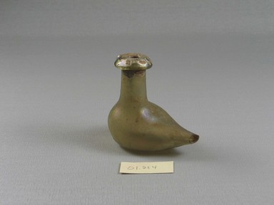 Roman. <em>Bottle of Plain Blown Glass</em>, 2nd–early 3rd century C.E. Glass, 2 11/16 x 1 3/4 x 2 15/16 in. (6.8 x 4.5 x 7.4 cm). Brooklyn Museum, Gift of Robert B. Woodward, 01.284. Creative Commons-BY (Photo: Brooklyn Museum, CUR.01.284.jpg)