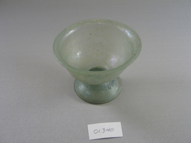 Roman. <em>Cup of Plain Blown Glass</em>, 3rd-4th century C.E. Glass, 2 15/16 x greatest diam. 3 7/8 in. (7.4 x 9.9 cm). Brooklyn Museum, Gift of Robert B. Woodward, 01.340. Creative Commons-BY (Photo: Brooklyn Museum, CUR.01.340.jpg)
