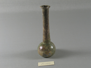 Roman. <em>Bottle of Blown Glass</em>, 1st-early 8th century C.E. Glass, 3 15/16 x Diam. 1 1/2 in. (10 x 3.8 cm). Brooklyn Museum, Gift of Robert B. Woodward, 01.400. Creative Commons-BY (Photo: Brooklyn Museum, CUR.01.400_view2.jpg)