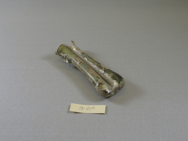 Roman. <em>Double Cosmetic Tube</em>, 4th-5th century C.E. Glass, 1 5/8 x 15/16 x 4 7/8 in. (4.2 x 2.4 x 12.4 cm). Brooklyn Museum, Gift of Robert B. Woodward, 01.409. Creative Commons-BY (Photo: Brooklyn Museum, CUR.01.409_view1.jpg)
