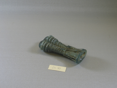 Roman. <em>Double Cosmetic Tube</em>, 4th-5th century C.E. Glass, 4 1/2 x 1 3/4 in. (11.5 x 4.4 cm). Brooklyn Museum, Gift of Robert B. Woodward, 01.40. Creative Commons-BY (Photo: Brooklyn Museum, CUR.01.40_view1.jpg)