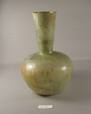 Roman. <em>Decanter of Plain Blown Glass</em>, 1st-early 8th century C.E. Glass, 10 1/16 x greatest diam. 6 15/16 in. (25.5 x 17.7 cm). Brooklyn Museum, Gift of Robert B. Woodward, 01.461. Creative Commons-BY (Photo: Brooklyn Museum, CUR.01.461_view1.jpg)