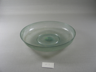 Roman. <em>Bowl of Plain Blown Glass</em>, late 4th century C.E. Glass, 1 1/4 x Diam. 8 3/8 in. (3.1 x 21.2 cm). Brooklyn Museum, Gift of Robert B. Woodward, 01.7. Creative Commons-BY (Photo: Brooklyn Museum, CUR.01.7.jpg)