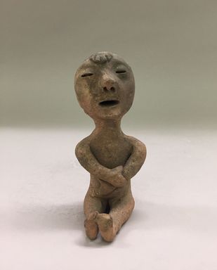 Tue-I (Pueblo Isleta). <em>Seated Figurine</em>, Late 19th - early 20th century. Clay, 5 1/4 × 2 1/2 × 3 in. (13.3 × 6.4 × 7.6 cm). Brooklyn Museum, Riggs Pueblo Pottery Fund, 02.257.2545. Creative Commons-BY (Photo: , CUR.02.257.2545_view01.jpg)
