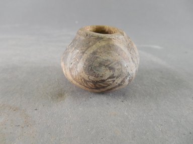 Ancient Pueblo. <em>Miniature Jar</em>. Clay, slip, 1 1/2 x 1 3/4 in.  (3.8 x 4.4 cm). Brooklyn Museum, Riggs Pueblo Pottery Fund, 02.257.2612. Creative Commons-BY (Photo: Brooklyn Museum, CUR.02.257.2612.jpg)