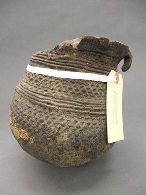 Ancient Pueblo (Anasazi). <em>Corrugated Pot</em>, Probably 700-1100, Pueblo I-II. Clay, 8 1/4 x 7 1/2 in. (21 x 19.1 cm). Brooklyn Museum, Museum Expedition 1903, Purchased with funds given by A. Augustus Healy and George Foster Peabody, 03.325.11023. Creative Commons-BY (Photo: Brooklyn Museum, CUR.03.325.11023.jpg)