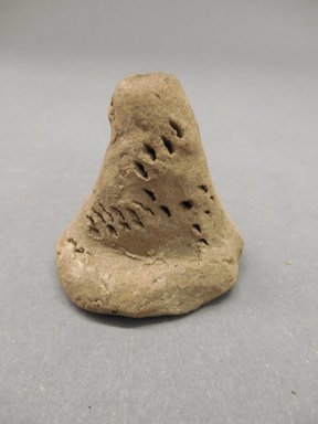 Southwest (unidentified). <em>Unfired Clay Cone</em>, 450-700, Basketmaker III. Clay, 1 5/8 × 1 3/4 × 1 3/16 in. (4.1 × 4.4 × 3 cm). Brooklyn Museum, Museum Expedition 1903, Purchased with funds given by A. Augustus Healy and George Foster Peabody, 03.325.12304. Creative Commons-BY (Photo: Brooklyn Museum, CUR.03.325.12304_view1.jpg)
