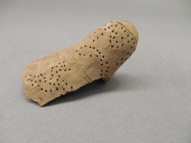 Pueblo (unidentified). <em>Unfired Clay Fragment</em>, 450-700, Basketmaker III. Clay, 2 1/2 x 2 in. (6.4 x 5.1 cm). Brooklyn Museum, Museum Expedition 1903, Purchased with funds given by A. Augustus Healy and George Foster Peabody, 03.325.12308. Creative Commons-BY (Photo: Brooklyn Museum, CUR.03.325.12308_view1.jpg)