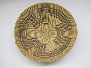 Navajo. <em>Coiled Basket (Ts'a) with Dyed Alternating Wedge Pattern</em>. Fiber, dye, 3 1/2 x 11 3/4 in. (29.5 x 9.0 cm). Brooklyn Museum, Museum Expedition 1903, Museum Collection Fund, 03.325.3612. Creative Commons-BY (Photo: , CUR.03.325.3612_view01.jpg)