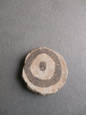 Ancient Pueblo (Anasazi). <em>Disk</em>. Clay, pigment, diameter: 1 3/16 in. (3 cm). Brooklyn Museum, Museum Expedition 1903, Museum Collection Fund, 03.325.3971. Creative Commons-BY (Photo: Brooklyn Museum, CUR.03.325.3971.jpg)