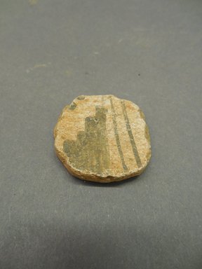 Ancient Pueblo. <em>Disk</em>. Clay, pigment, diameter: 1 5/16 in. (3.4 cm). Brooklyn Museum, Museum Expedition 1903, Museum Collection Fund, 03.325.3972. Creative Commons-BY (Photo: Brooklyn Museum, CUR.03.325.3972.jpg)