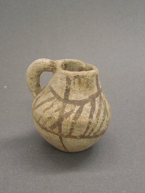 Ancient Pueblo. <em>Miniature Pitcher</em>, 1025-1150. Clay, slip, 2 1/2 × 2 3/8 × 2 3/16 in. (6.3 × 6 × 5.5 cm). Brooklyn Museum, Museum Expedition 1903, Museum Collection Fund, 03.325.4197. Creative Commons-BY (Photo: Brooklyn Museum, CUR.03.325.4197.jpg)