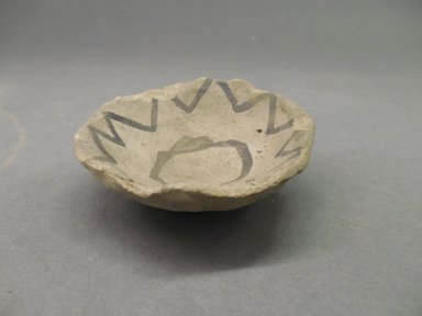 Ancestral Pueblo. <em>Bowl</em>, 550–750. Ceramic, pigment, 1/2 x 2 3/8 in. (1.3 x 6 cm). Brooklyn Museum, Museum Expedition 1903, Museum Collection Fund, 03.325.4275. Creative Commons-BY (Photo: Brooklyn Museum, CUR.03.325.4275.jpg)