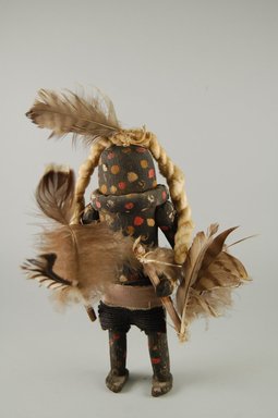 She-we-na (Zuni Pueblo). <em>Kachina Doll (Schutawetsa Kweha)</em>, late 19th century. Wood, pigment, fabric, feather, yarn, 9 x 1 1/16 in. (22.9 x 2.8 cm). Brooklyn Museum, Museum Expedition 1903, Museum Collection Fund, 03.325.4637. Creative Commons-BY (Photo: Brooklyn Museum, CUR.03.325.4637_front.jpg)