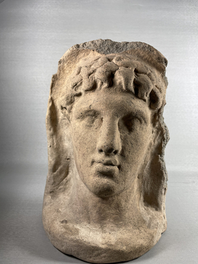 Possibly Greek. <em>Votive Head of Clay</em>. Terracotta, 10 1/16 × 7 15/16 × 5 1/2 in. (25.5 × 20.1 × 14 cm). Brooklyn Museum, Purchase gift of Robert B. Woodward and Carll H. de Silver, 04.17. Creative Commons-BY (Photo: Brooklyn Museum, CUR.04.17_view01.jpeg)