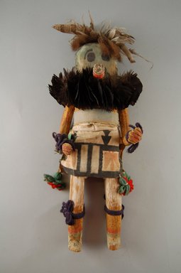 Mau-i (A:shiwi (Zuni Pueblo)). <em>Kachina Doll (Thlecheche)</em>, late 19th–early 20th century. Feathers, buffalo fur, wood, pigment, cotton, yarn, 16 1/4 × 6 1/2 × 4 3/4 in. (41.3 × 16.5 × 12.1 cm). Brooklyn Museum, Museum Expedition 1904, Museum Collection Fund, 04.297.5333. Creative Commons-BY (Photo: Brooklyn Museum, CUR.04.297.5333_front.jpg)