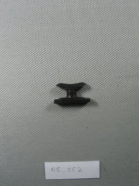  <em>Headrest Amulet</em>, 664-332 B.C.E. Hematite, 1/2 x 1/4 x 7/8 in. (1.3 x 0.6 x 2.3 cm). Brooklyn Museum, Charles Edwin Wilbour Fund, 05.352. Creative Commons-BY (Photo: Brooklyn Museum, CUR.05.352_overall.jpg)