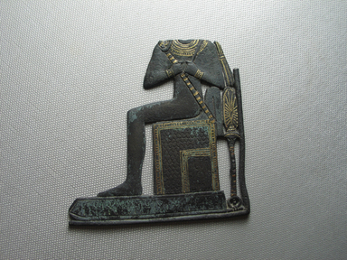  <em>Osiris on a Throne</em>, 664-525 B.C.E. Bronze, gold, 3 3/4 × 3 3/4 × 3/16 in. (9.6 × 9.5 × 0.4 cm). Brooklyn Museum, Charles Edwin Wilbour Fund, 05.357. Creative Commons-BY (Photo: , CUR.05.357_view01.jpg)