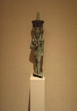  <em>The God Nefertem</em>, ca. 664-525 B.C.E. or later. Bronze, silver, 14 1/4 x 3 1/16 x 4 1/2 in. (36.2 x 7.8 x 11.5 cm). Brooklyn Museum, Charles Edwin Wilbour Fund, 05.393. Creative Commons-BY (Photo: Brooklyn Museum, CUR.05.393_wwg8.jpg)