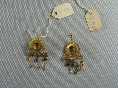 Roman. <em>Pair of Earrings</em>, 3rd century C.E. Gold, 05.426.1: 7/8 x (Diam.) 1 7/16 in. (2.2 x 3.6 cm). Brooklyn Museum, Ella C. Woodward Memorial Fund, 05.426.1-.2. Creative Commons-BY (Photo: Brooklyn Museum, CUR.05.426.1-.2_overall.jpg)