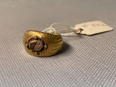 Roman. <em>Finger Ring</em>, 3rd century C.E. Gold, glass, 13/16 in. (2 cm). Brooklyn Museum, Ella C. Woodward Memorial Fund, 05.513. Creative Commons-BY (Photo: Brooklyn Museum, CUR.05.513_overall.JPG)