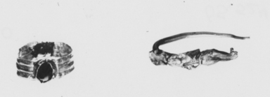 Roman. <em>Small Finger Ring</em>, 2nd-3rd century C.E. Gold, garnet, 3/16 x 7/16 in. (0.4 x 1.1 cm). Brooklyn Museum, Ella C. Woodward Memorial Fund, 05.520. Creative Commons-BY (Photo: , CUR.05.520_05.524_NegID_05.520_GRPA_print_bw.jpg)