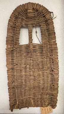 Hopi-Tewa Pueblo. <em>Cradle (Tewa: Kong Hopi: Ngu-la)</em>, late 19th - early 20th century. Wicker, copper wire, (51 x 25.8 x 2.5 cm). Brooklyn Museum, Museum Expedition 1905, Museum Collection Fund, 05.588.7150. Creative Commons-BY (Photo: Brooklyn Museum, CUR.05.588.7150_view01.jpg)
