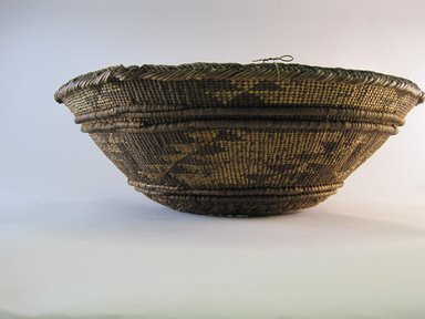 Hupa. <em>Mortar Rim</em>. Plant fiber, 5 9/16 × 17 1/8 × 17 3/16 in. (14.1 × 43.5 × 43.7 cm). Brooklyn Museum, Museum Expedition 1905, Museum Collection Fund, 05.588.7465. Creative Commons-BY (Photo: Brooklyn Museum, CUR.05.588.7465.jpg)