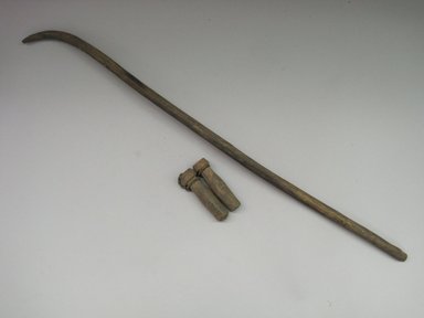 Hupa. <em>Stick and Tied Billets for Tossing Game</em>. Wood, hide, Stick (a): 1 1/8 × 5/8 × 27 1/2 in. (2.9 × 1.6 × 69.9 cm). Brooklyn Museum, Museum Expedition 1905, Museum Collection Fund, 05.588.7487a-c. Creative Commons-BY (Photo: Brooklyn Museum, CUR.05.588.7487a-c.jpg)