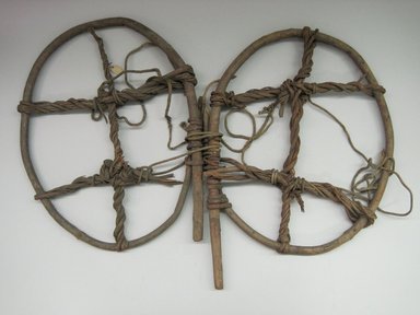 Yurok. <em>Snow Shoes</em>. Grape vine, 18 1/2 × 1 1/2 × 26 3/4 in. (47 × 3.8 × 67.9 cm). Brooklyn Museum, Museum Expedition 1905, Museum Collection Fund, 05.588.7514a-b. Creative Commons-BY (Photo: Brooklyn Museum, CUR.05.588.7514a-b.jpg)