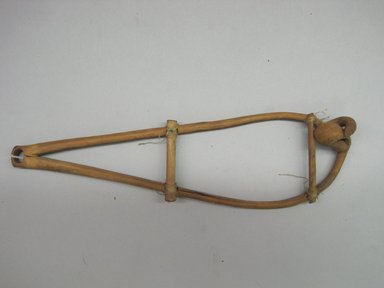 Yurok. <em>Woodpecker Head Stretcher</em>. Hazelwood, 9 3/4 × 2 3/4 × 7/8 in. (24.8 × 7 × 2.2 cm). Brooklyn Museum, Museum Expedition 1905, Museum Collection Fund, 05.588.7565. Creative Commons-BY (Photo: Brooklyn Museum, CUR.05.588.7565.jpg)
