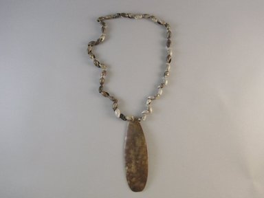 Yurok. <em>Hair Comb attached to necklace</em>. Antler, snail shell, cotton string, 16 1/8 x 1 3/4 x 17 11/16 in.  (41.0 x 4.4 x 45.0 cm). Brooklyn Museum, Museum Expedition 1905, Museum Collection Fund, 05.588.7601. Creative Commons-BY (Photo: Brooklyn Museum, CUR.05.588.7601_side+1.jpg)