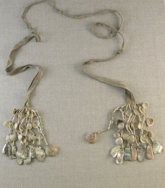 Yurok. <em>Necklace</em>. Hide, abalone and clam shell, bear grass, iris fiber, 1 x 2 9/16 x 20 7/8 in.  (2.5 x 6.5 x 53.0 cm). Brooklyn Museum, Museum Expedition 1905, Museum Collection Fund, 05.588.7635. Creative Commons-BY (Photo: Brooklyn Museum, CUR.05.588.7635.jpg)