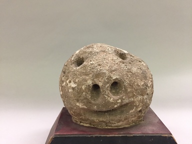 Pueblo, Keres. <em>Image Representing Smiling Face</em>, 1890-1900. Stone, 6 1/2 x 6 x 4 in.  (16.5 x 15.2 x 10.2 cm). Brooklyn Museum, Museum Expedition 1905, Museum Collection Fund, 05.588.7701. Creative Commons-BY (Photo: , CUR.05.588.7701_front.jpg)