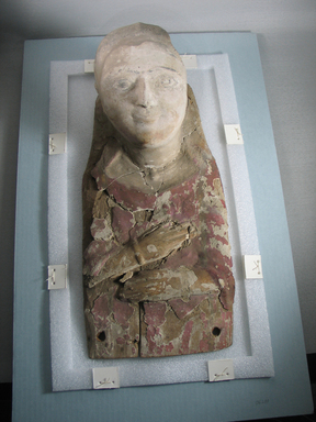 Graeco-Egyptian. <em>Mask of a Young Woman</em>, late 1st-early 2nd century C.E. Plaster, pigment, wood Brooklyn Museum, Museum Collection Fund, 06.288. Creative Commons-BY (Photo: Brooklyn Museum, CUR.06.288_view1.jpg)