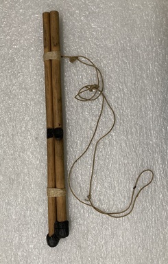 Pomo. <em>Double Flute (Whistle?)</em>. Wood, cord, string, (27.0 x 5.0 cm). Brooklyn Museum, Museum Expedition 1906, Museum Collection Fund, 06.331.8090. Creative Commons-BY (Photo: Brooklyn Museum, CUR.06.331.8090_view01.jpg)