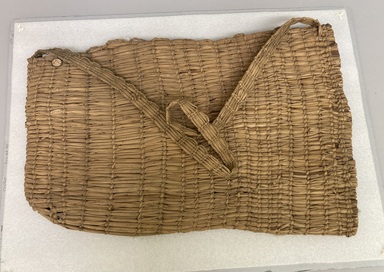 Mrs. Pen Graves (Pomo). <em>Doctor's Basket (ko-o shu-na) used to hold a dance dress</em>, late 19th - early 20th century. Rush, 16 5/8 × 26 × 1 3/4 in. (42.2 × 66 × 4.4 cm). Brooklyn Museum, Museum Expedition 1906, Museum Collection Fund, 06.331.8150. Creative Commons-BY (Photo: Brooklyn Museum, CUR.06.331.8150.jpg)